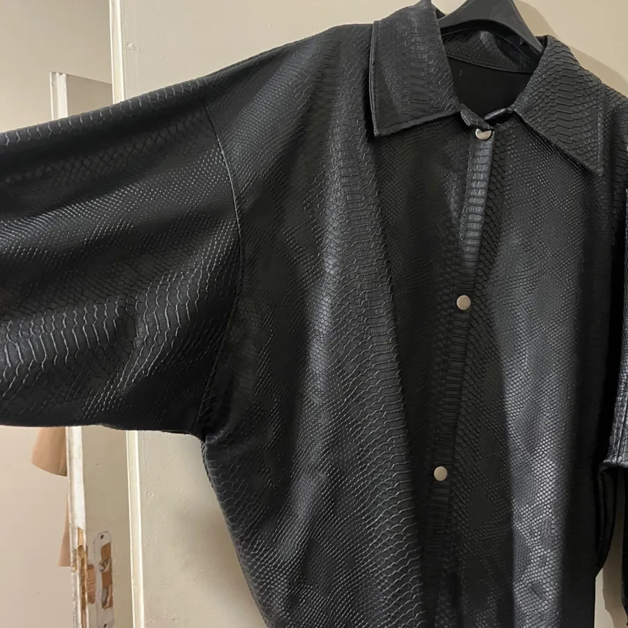 کت چرم پوست ماری مشکی