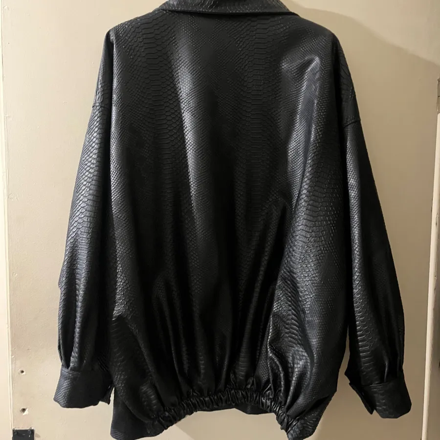 کت چرم پوست ماری مشکی