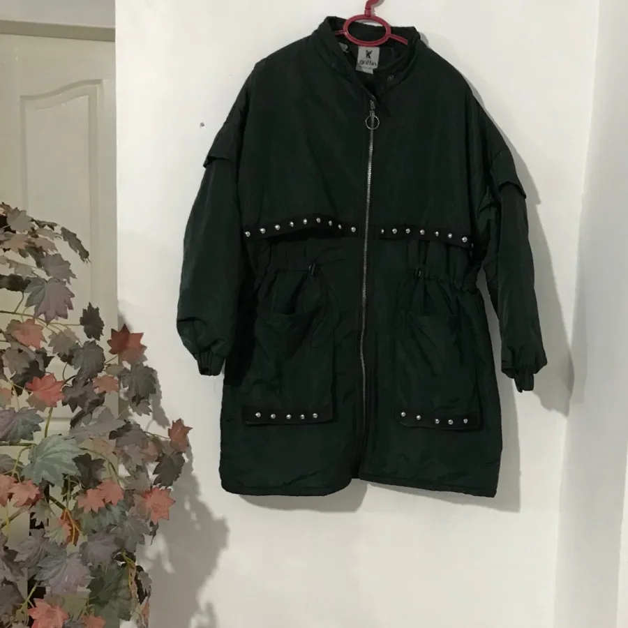 کاپشن با رویع بارانی