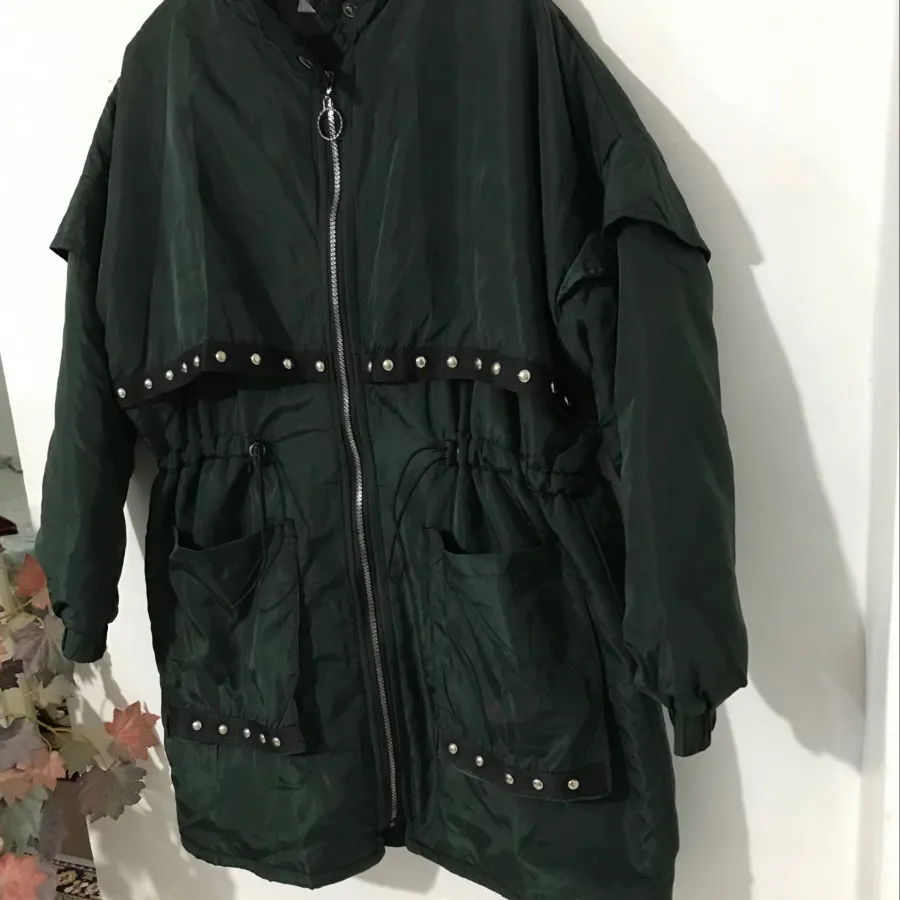 کاپشن با رویع بارانی