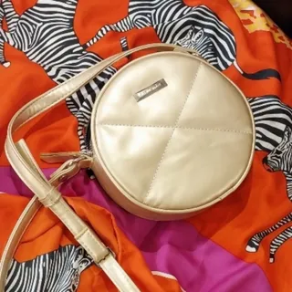 کیف طلایی گرد×××فروش رفت×