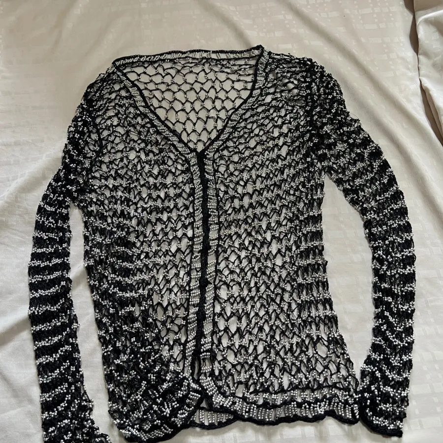 رویه لباس مهره دوزی