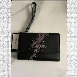 کیف دستی پول ناین وست