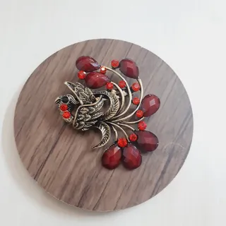 گل سینه طرح طاووس بزرگ