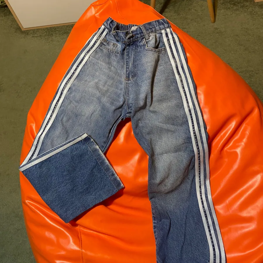 شلوار جین سه خط