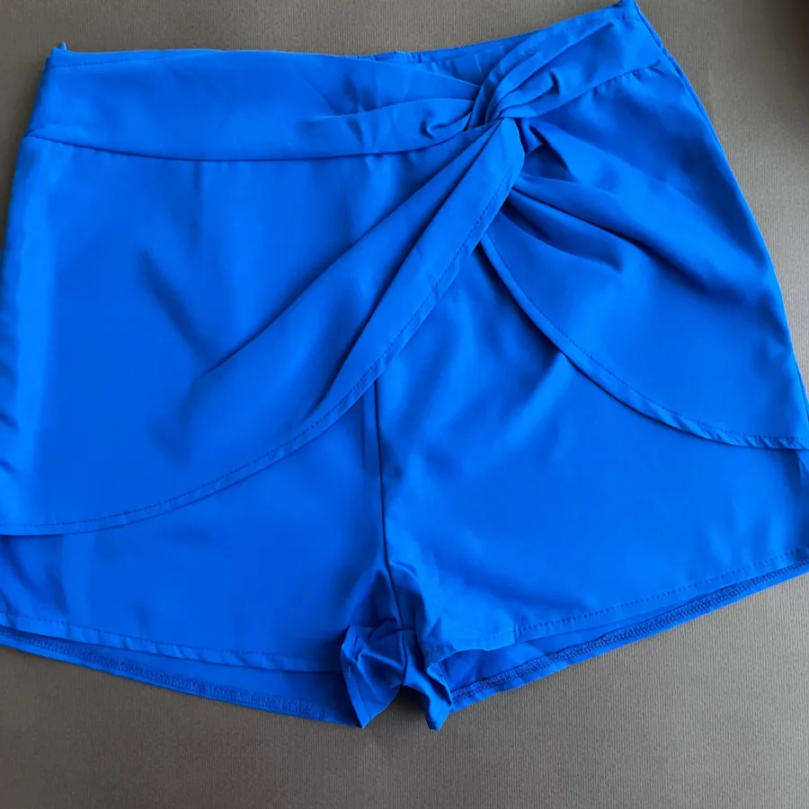 شلوارک طرح دامن