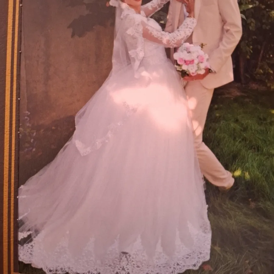 لباس عروس مزون دوز