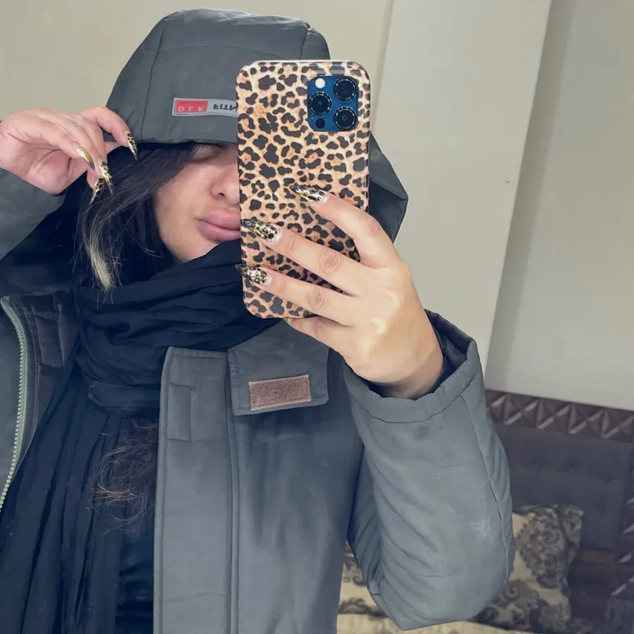 کاپشن بلند کلاه دار