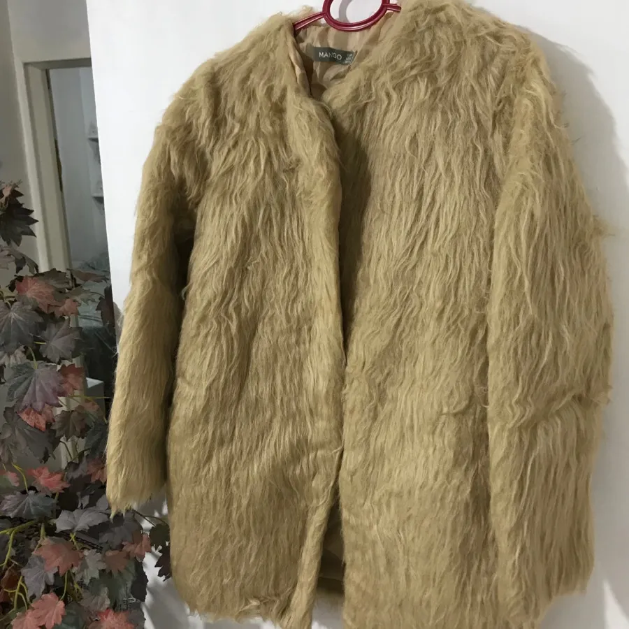 پالتو پوست پشمی