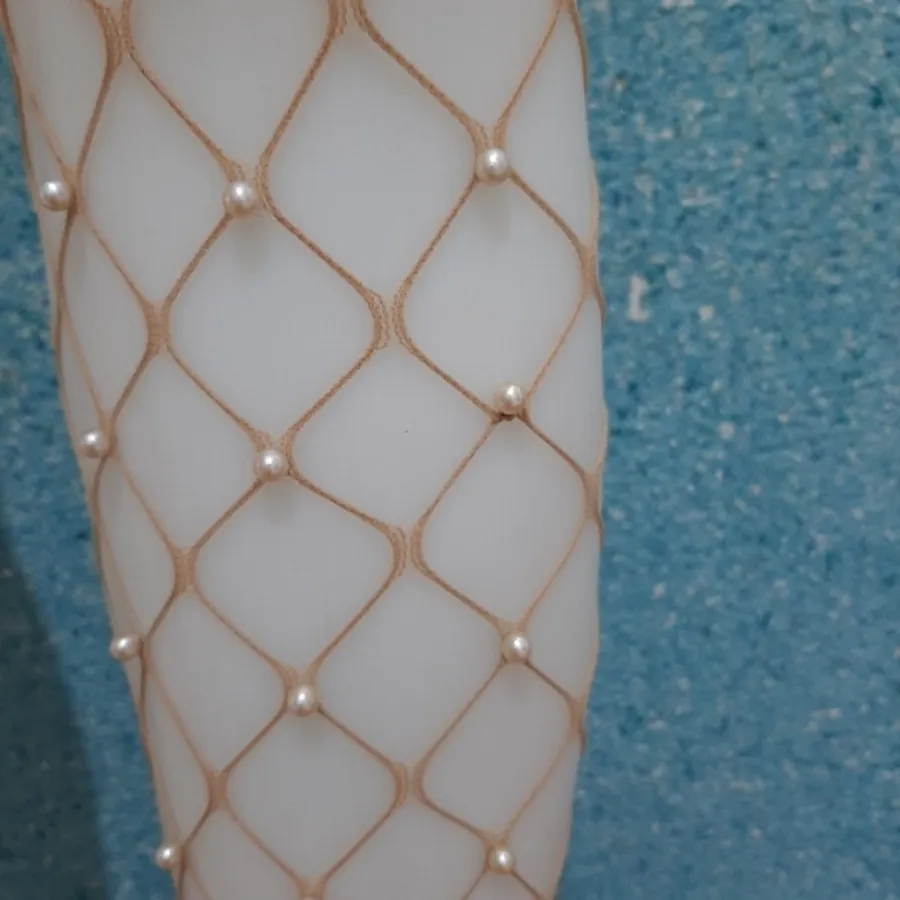 جوراب شلواری مرواریدی کرم