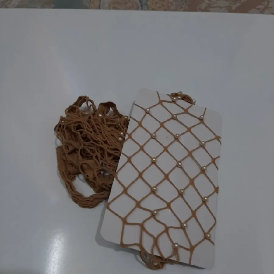 جوراب شلواری مرواریدی کرم