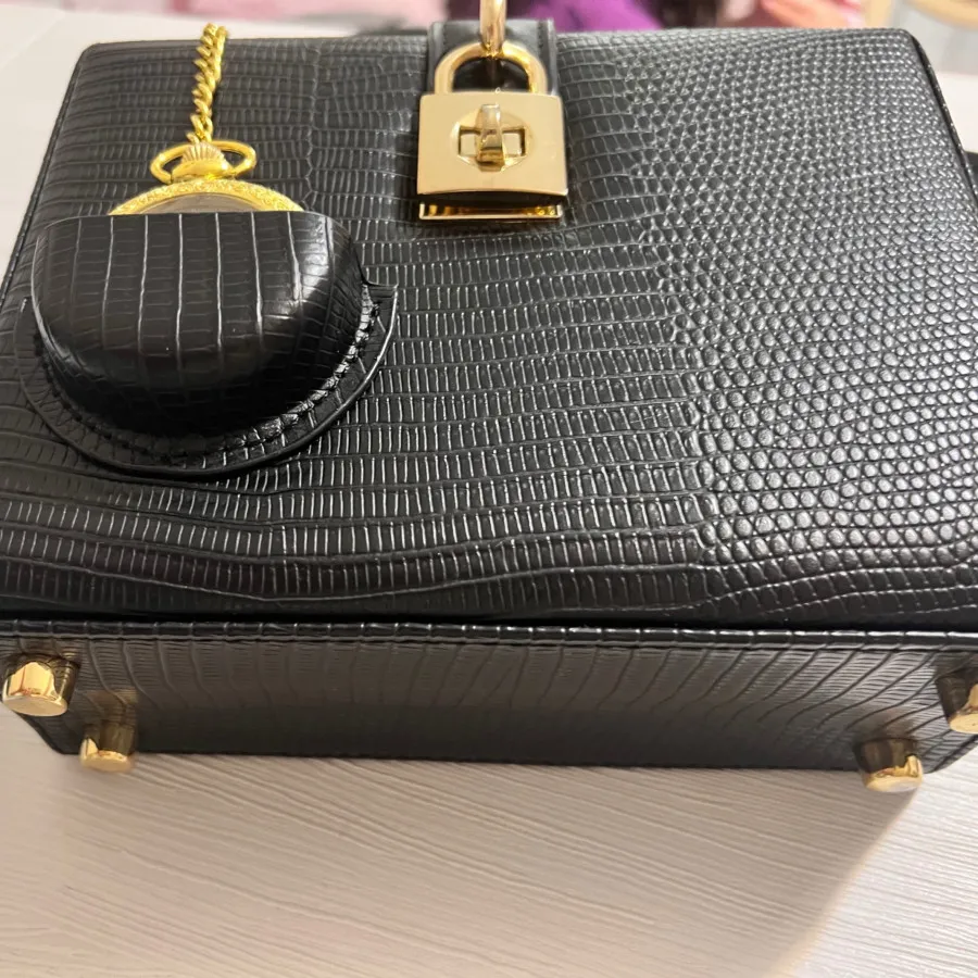 کیف مجلسی ساعت دار