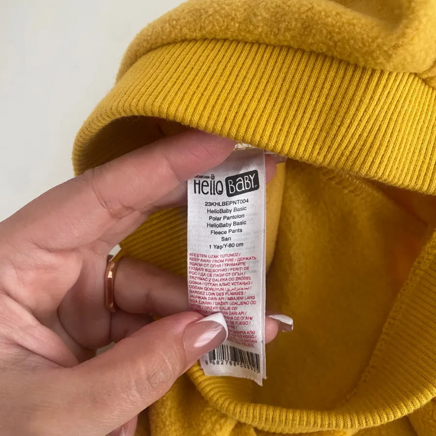 شلوار فوتر زرد hello baby