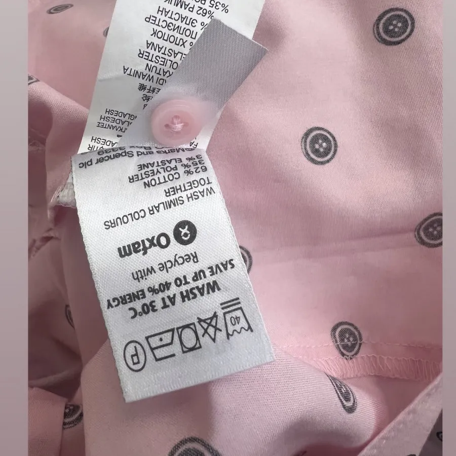 شومیز صورتی دکمه‌دار