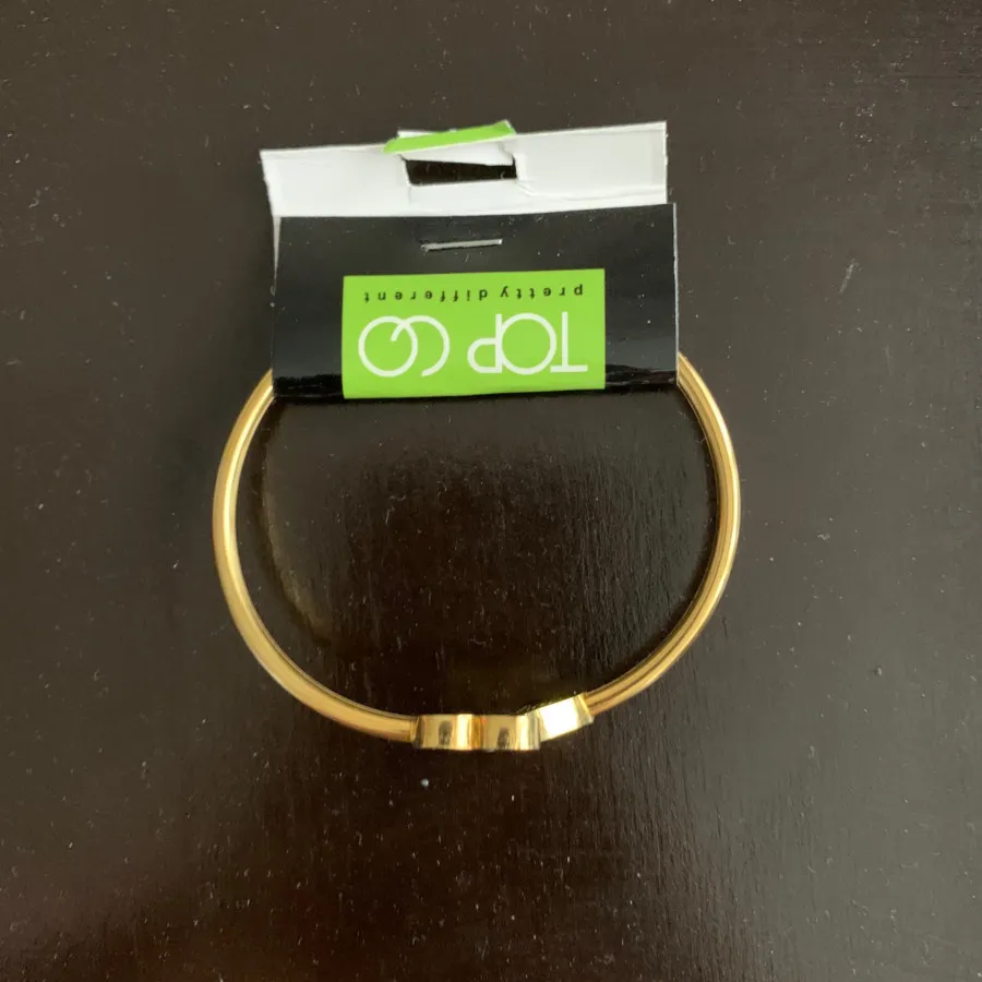 دستبند برند استیل طلایی