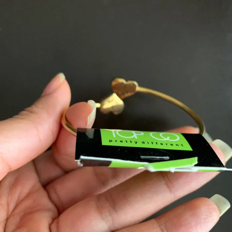 دستبند برند استیل طلایی