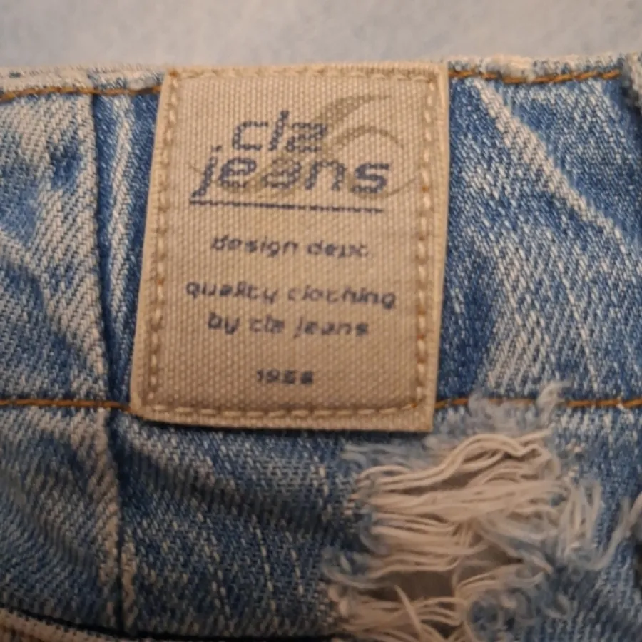 شلوارک جین زارپدار