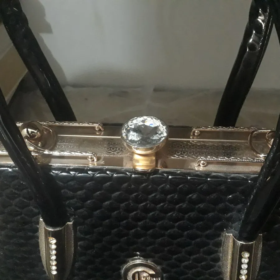 کیف ورنی پوست ماری