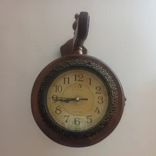 ساعت دیواری دوطرفه