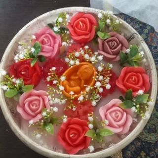شمع مدل نی نی و گل‌ها