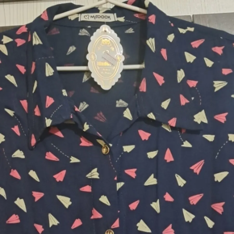 بلوز نخی آستین حلقه ای