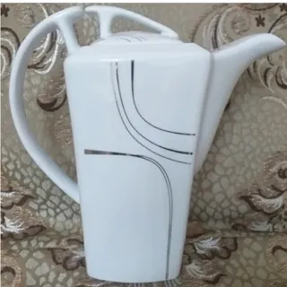 قوری شیر جوش