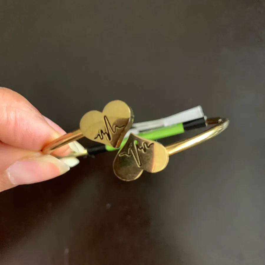 دستبند برند استیل طلایی