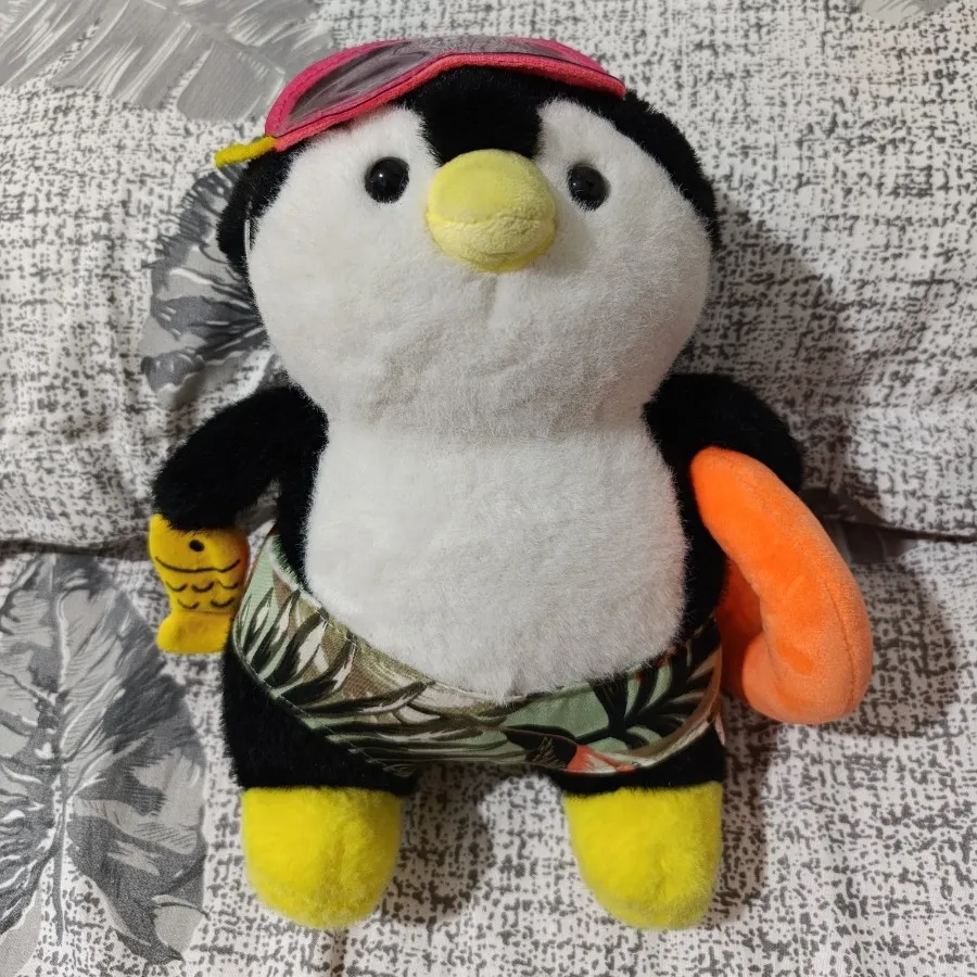 عروسک پنگوین غواص شناگر