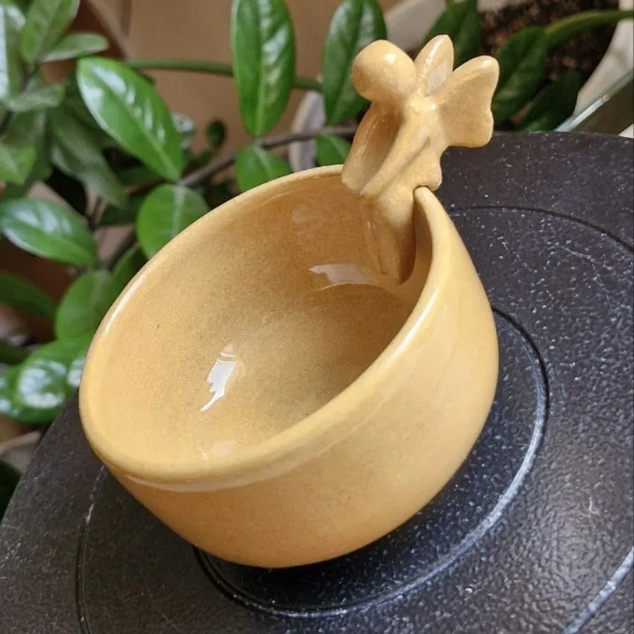 شمعدان فرشته سفالی