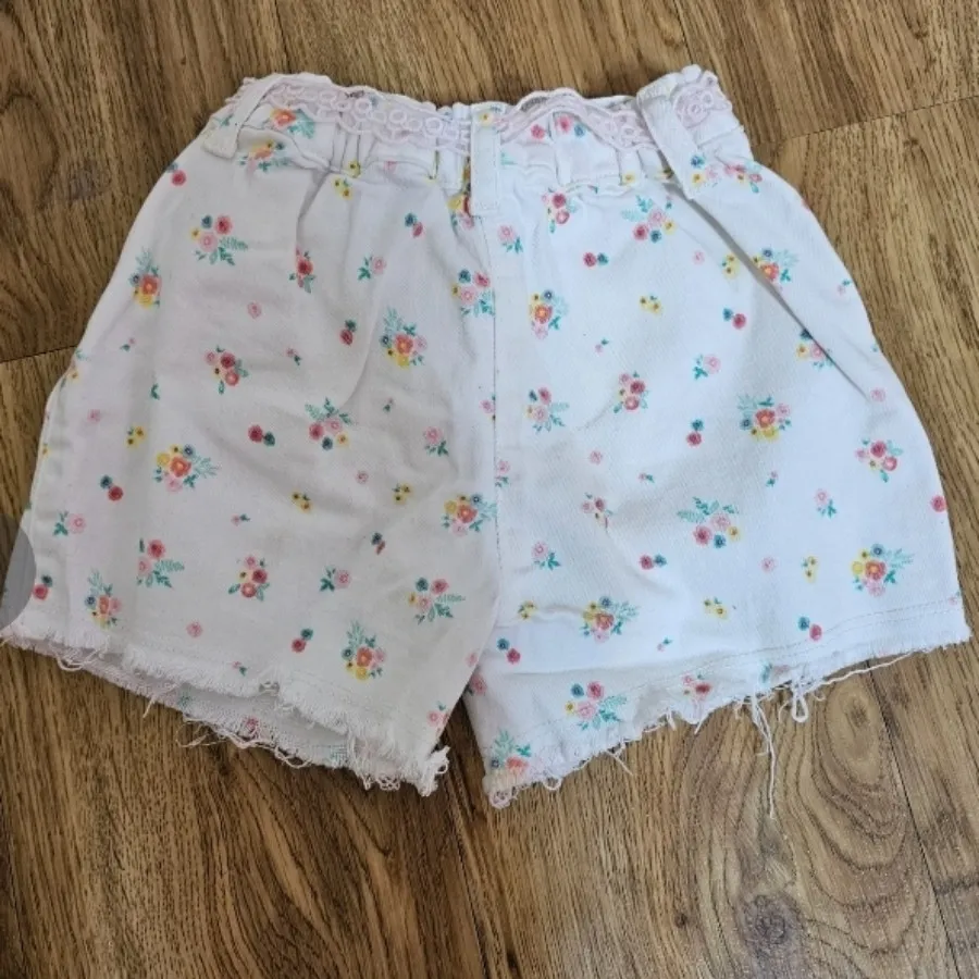 شلوارک جین گلگلی ال سی