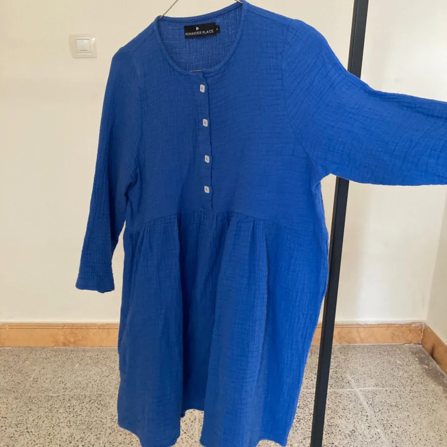 ‏پیراهن آبی