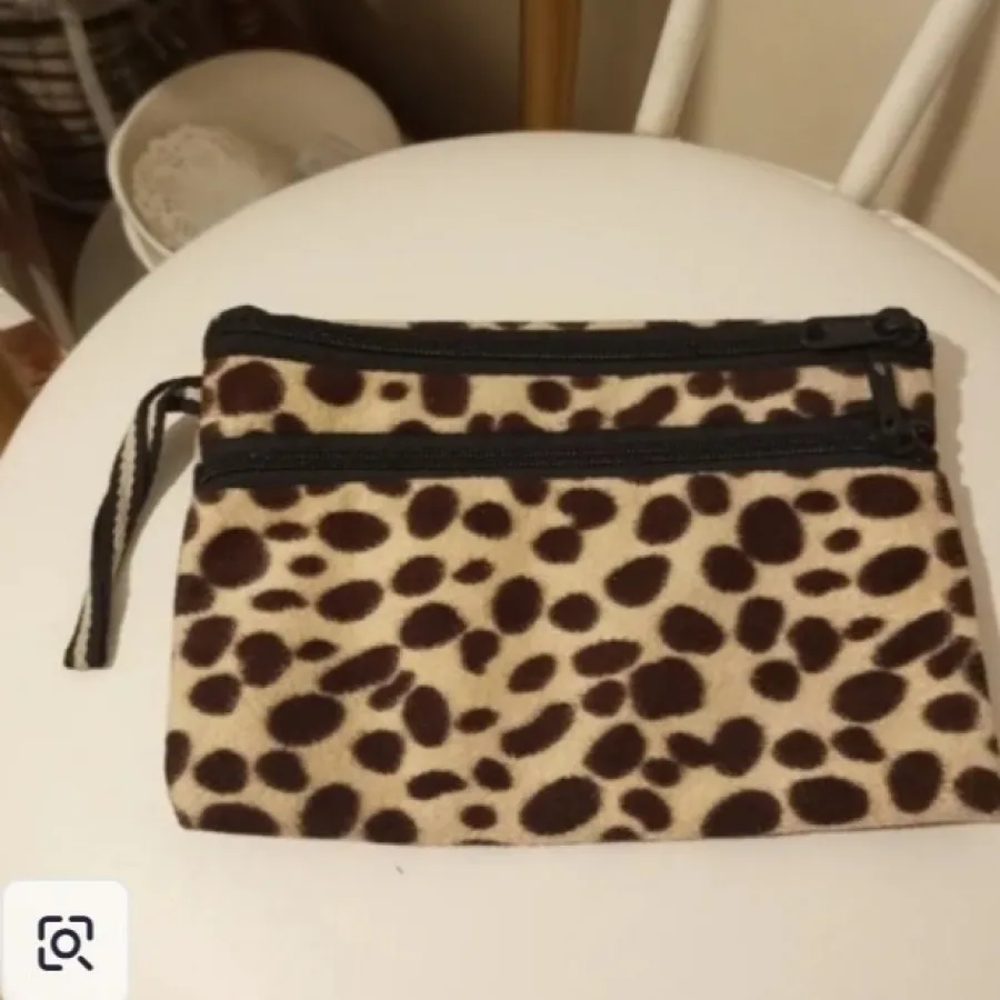 کیف لوازم آرایش پلنگی