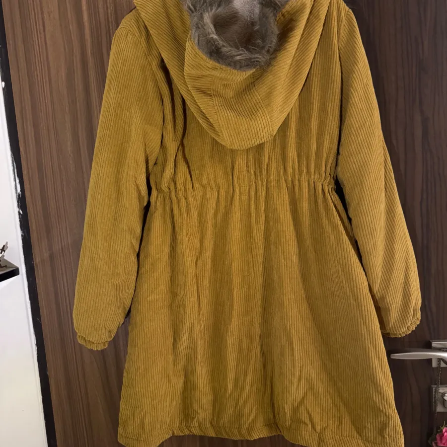 کاپشن گرم خردلی