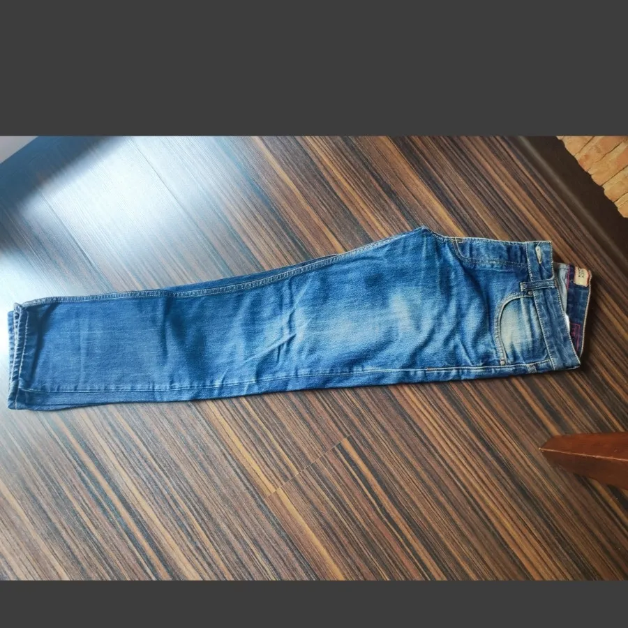 شلوار جین برند تامی