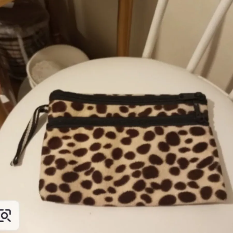 کیف لوازم آرایش پلنگی