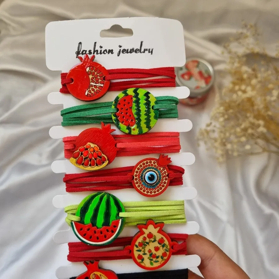 دستبند چوبی یلدایی بندچرم