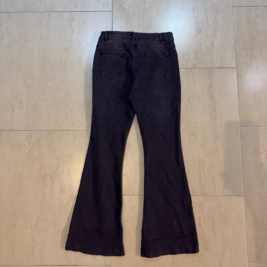 شلوار جین زغالی