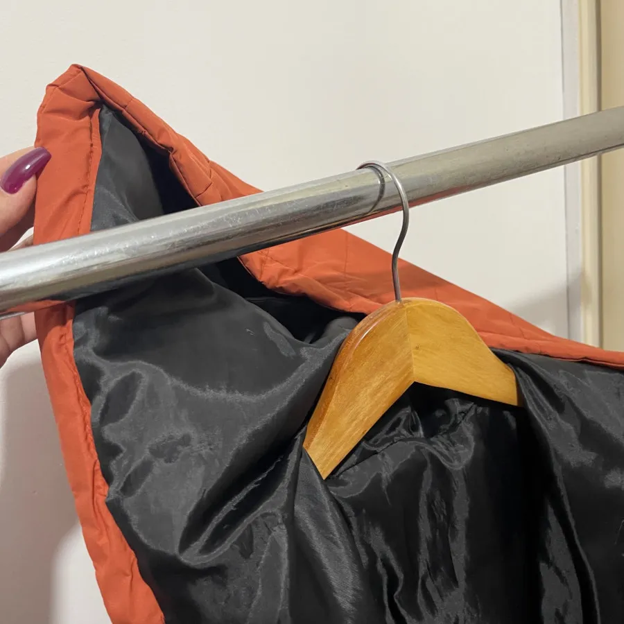 کاپشن بلند کلاهدار