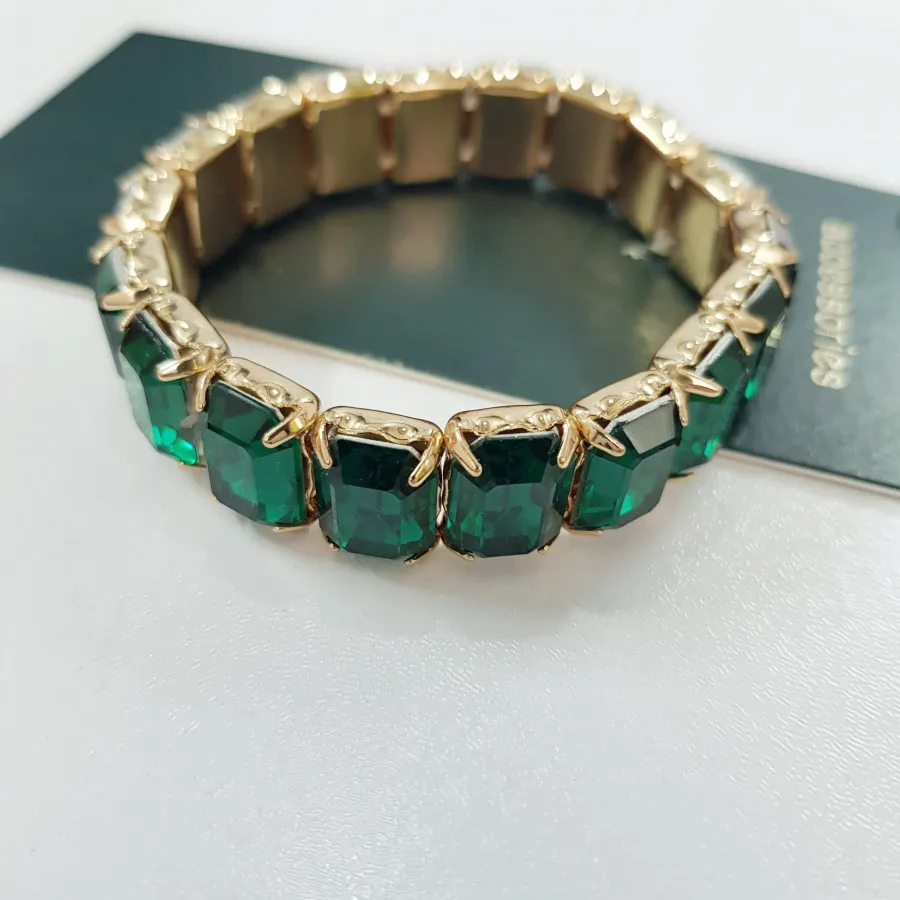 دستبند کشی طلایی نگین سبز