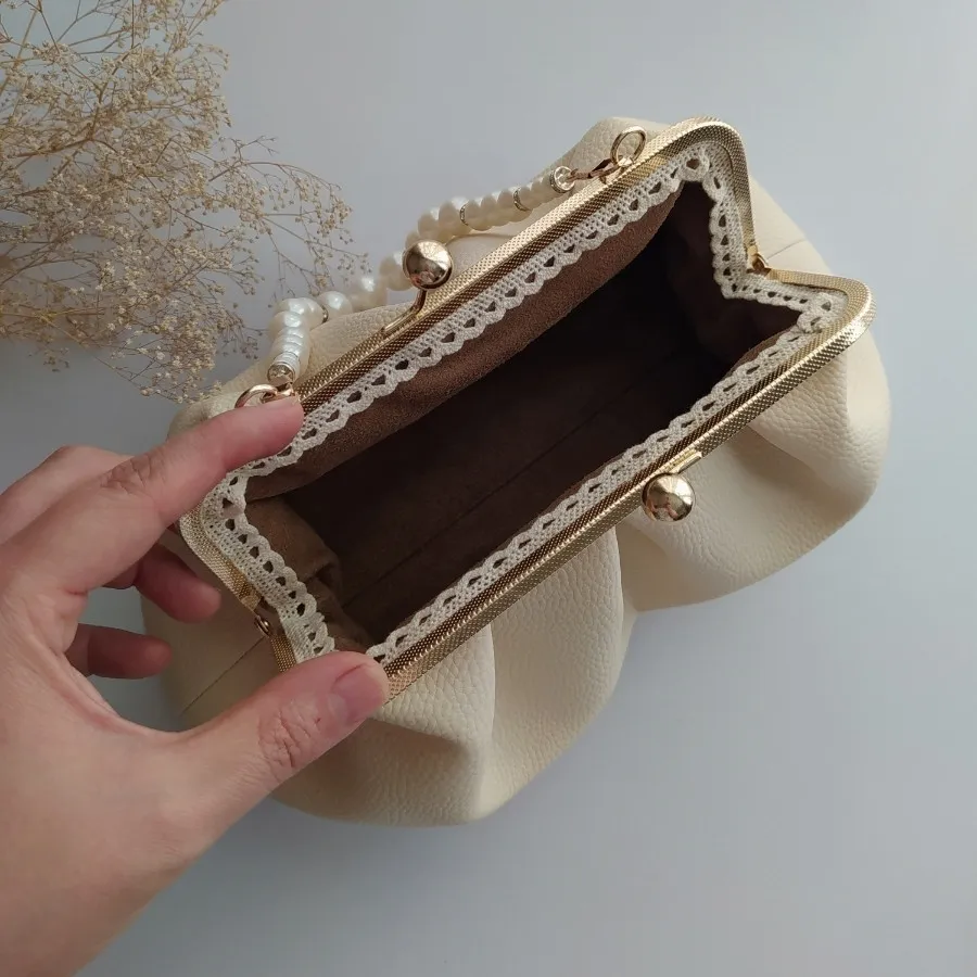 کیف زنانه دهانه فلزی