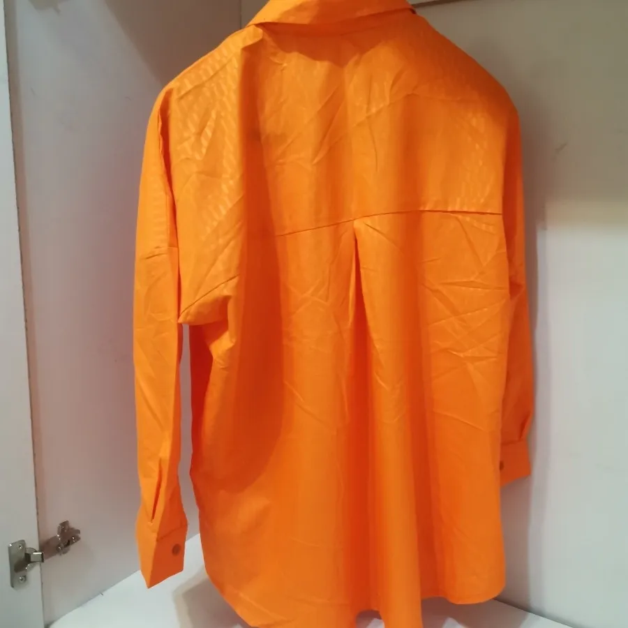 شومیز نارنجی نخی بزرگ