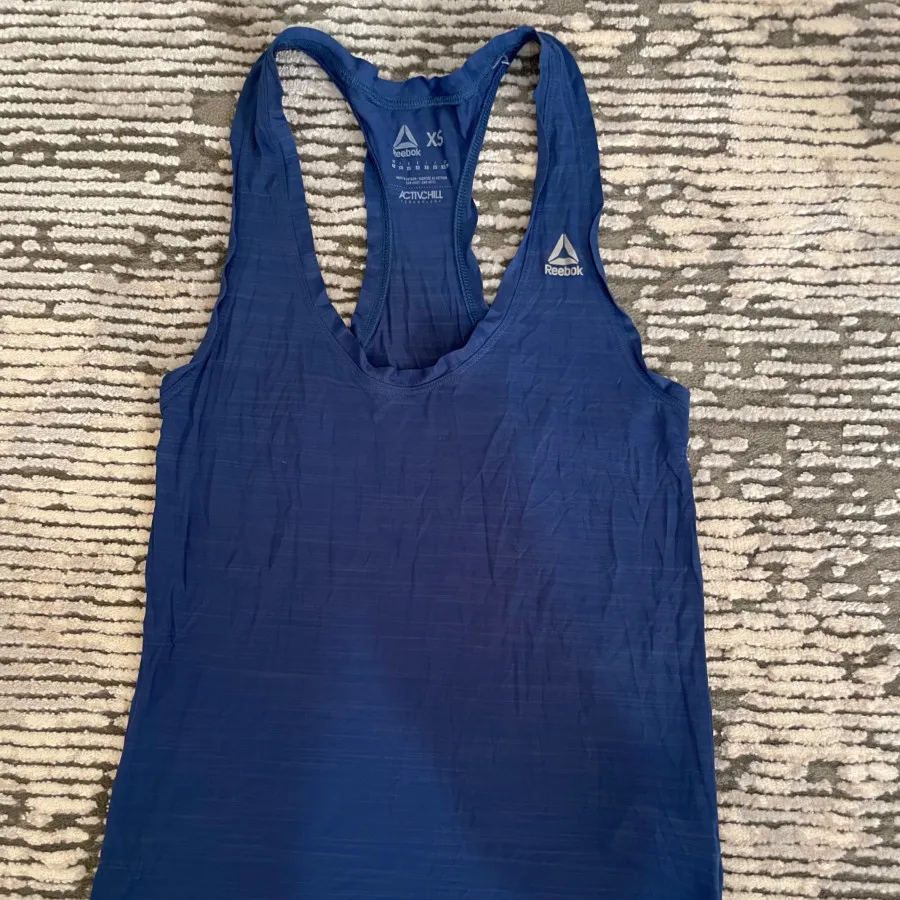 تاپ ورزشی ریباک