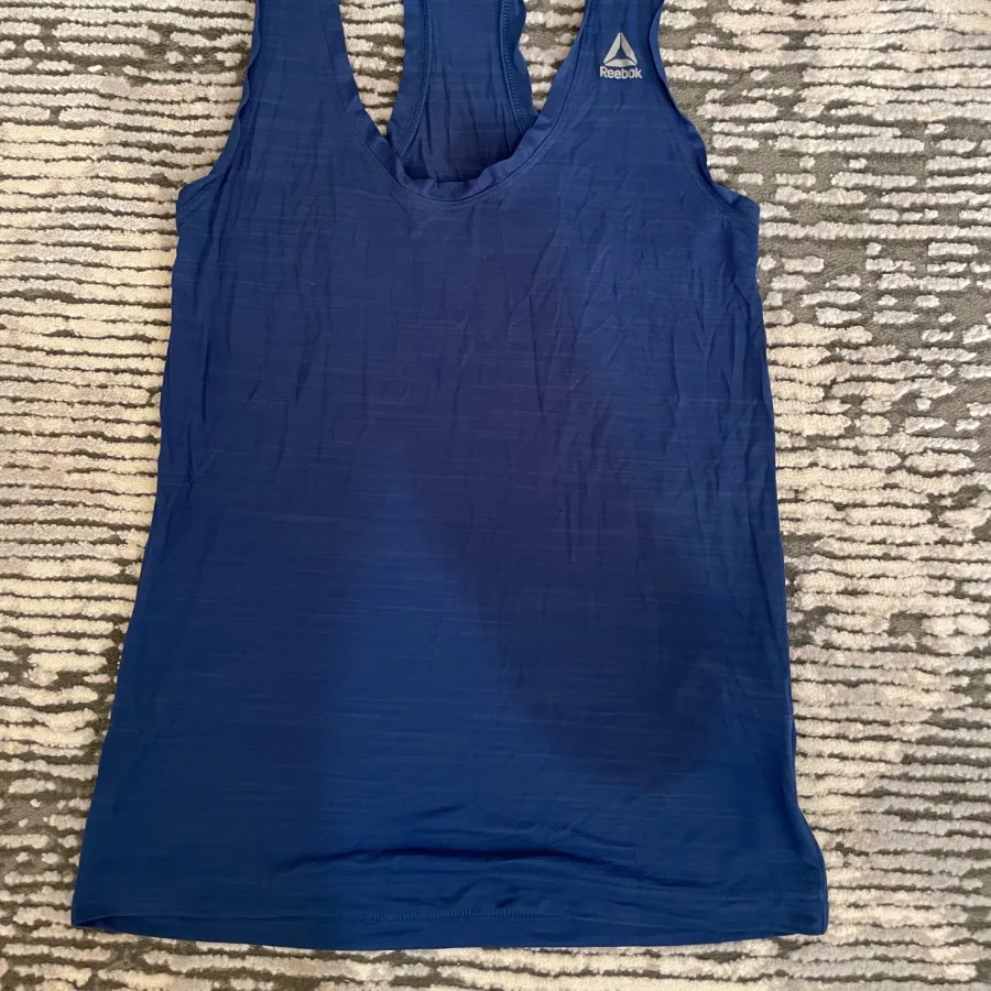 تاپ ورزشی ریباک
