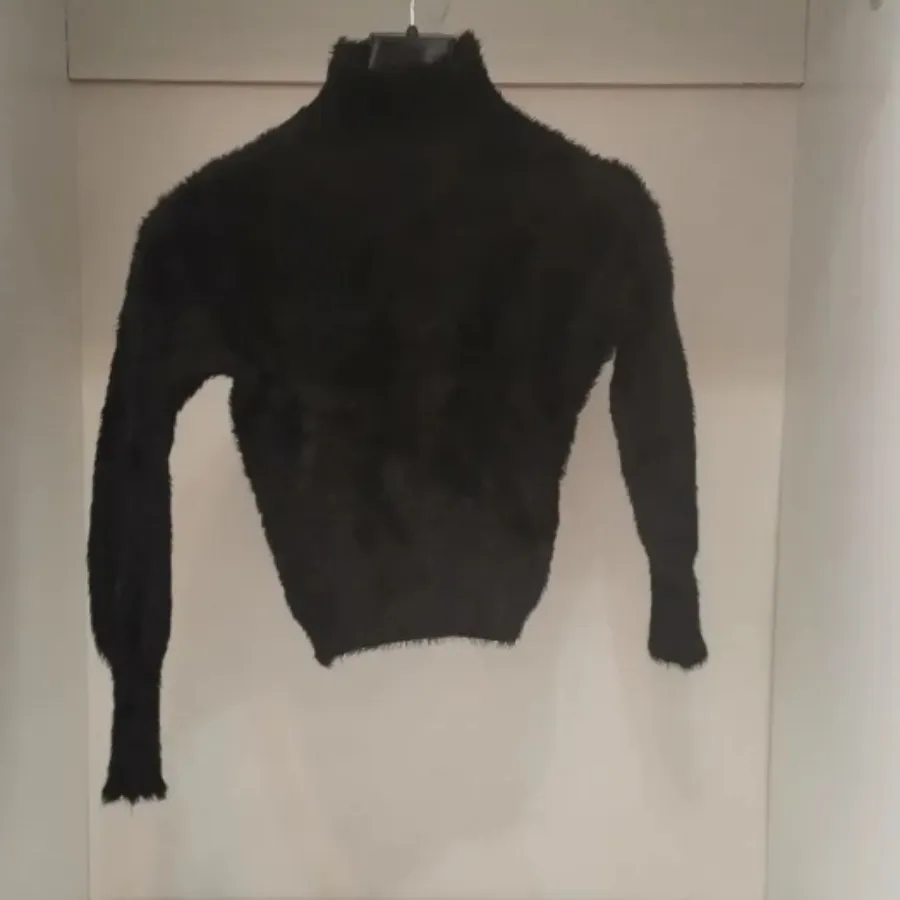 بافت مشکی موهربلندپرز