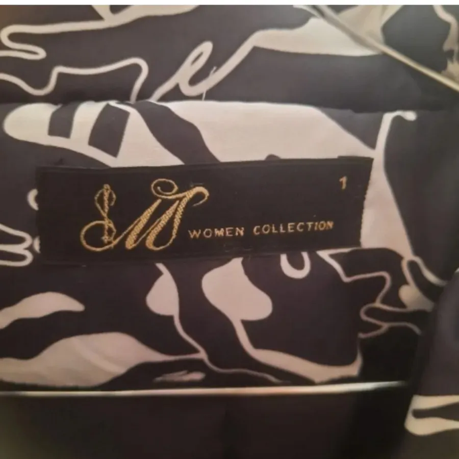 کاپشن شیک کلاهدار نوی نو