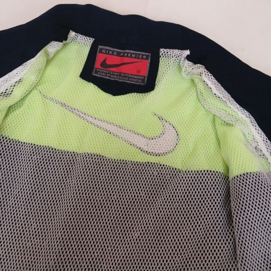 کاپشن ورزشی نایکی