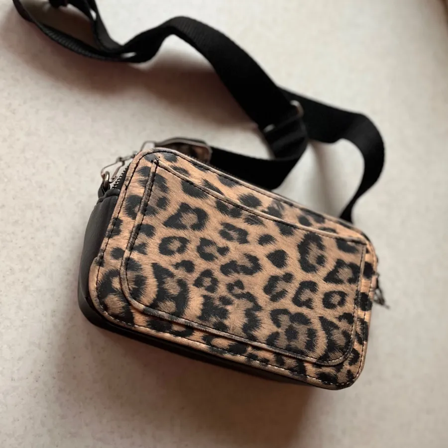 کیف مشکی پلنگی 100