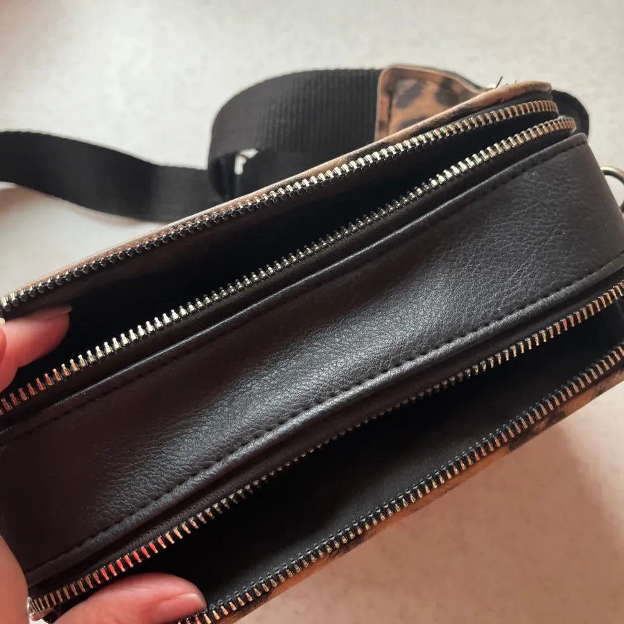 کیف مشکی پلنگی 100