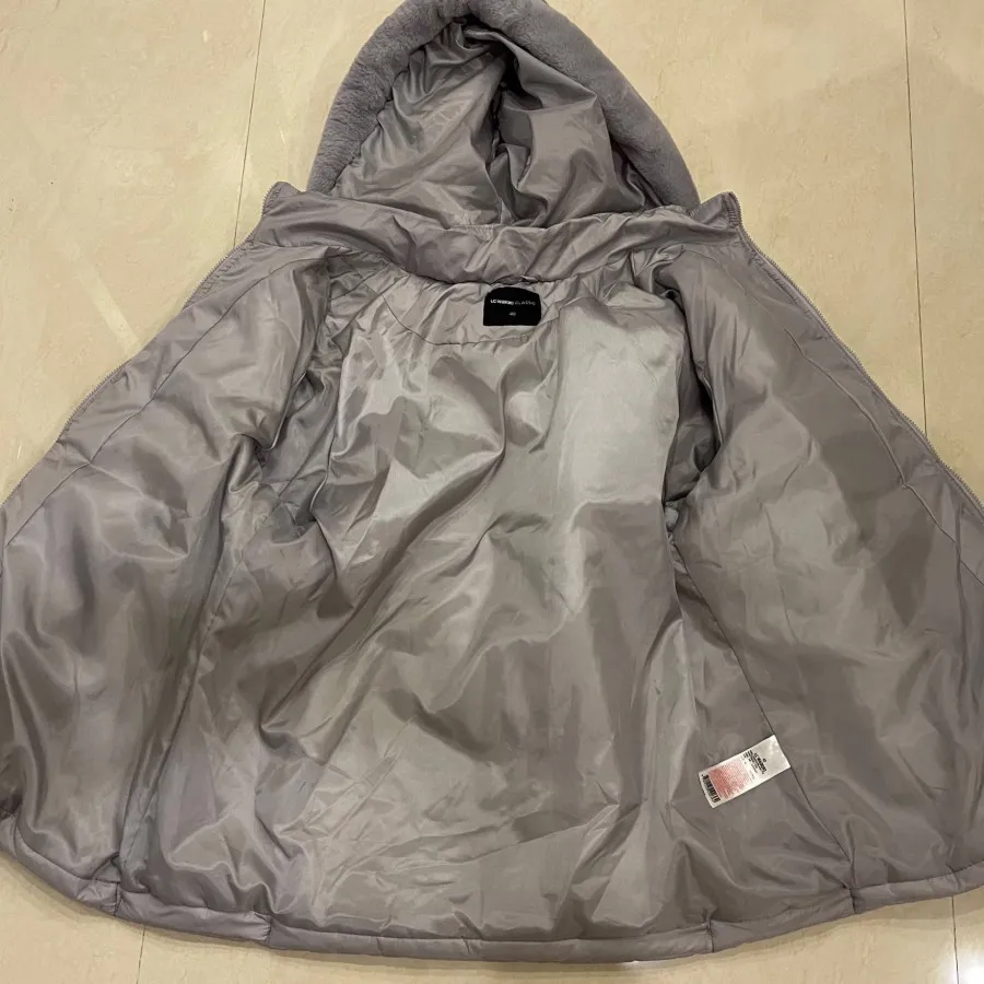 کاپشن ترک مارک ال‌ سی