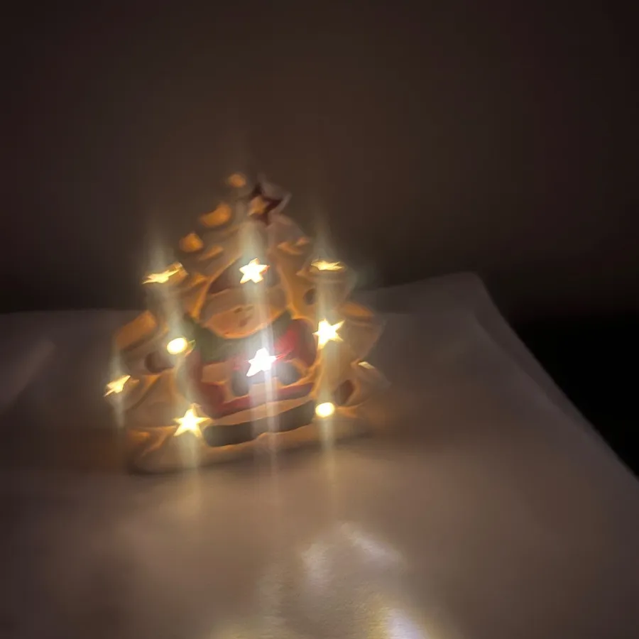 چراغ کریسمس و ادم برفی